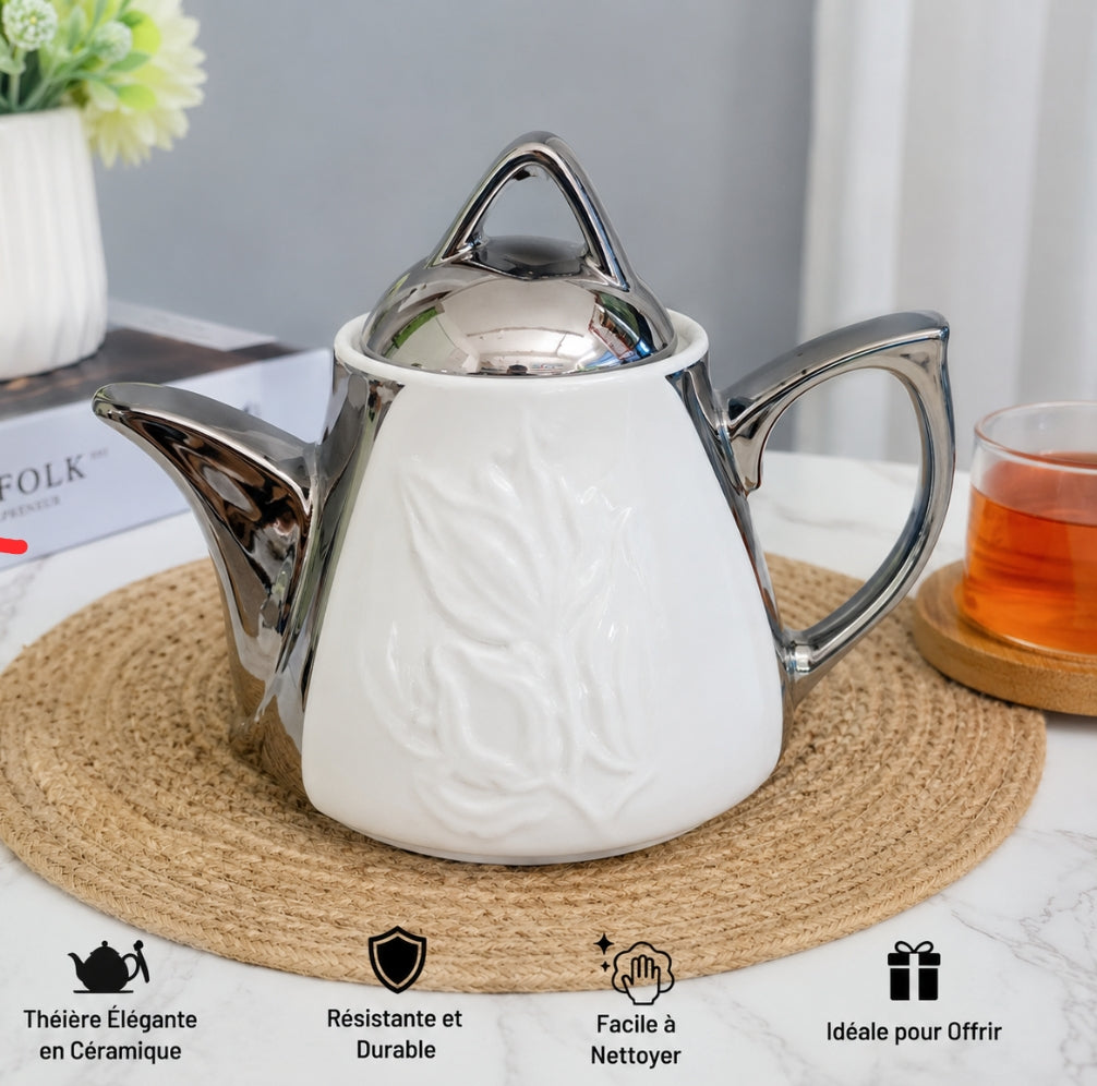 Nom du produit :
Théière / Cafetière en céramique avec couvercle effet inox – Design Élégant
Descriptif du produit :
Apportez une touche d'élégance à votre table avec cette magnifique théière en céramique blanche au design moderne, sublimée par une finiti
